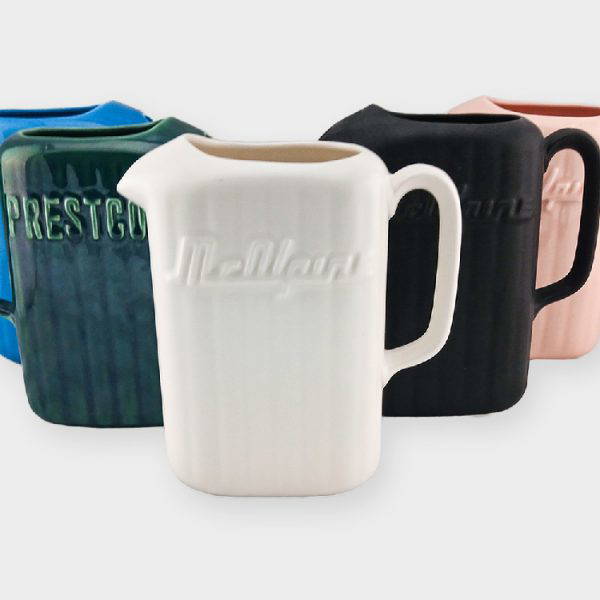 Crown Lynn McAlpine Prestcold Jugs in ivory, pink, blue and green. Made by Crown Lynn Kiwi