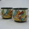 Mugs with landscape in orange, red, greens and blues