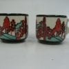 Mugs with landscape in reds and blues